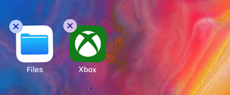 Apps on iOS with X in upper left corner. Screenshot.