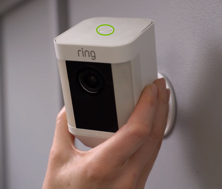 Placement of reset button on top of the camera