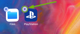 iOS main screen with PlayStation app that has an X highlighted in the upper left corner. Screenshot.
