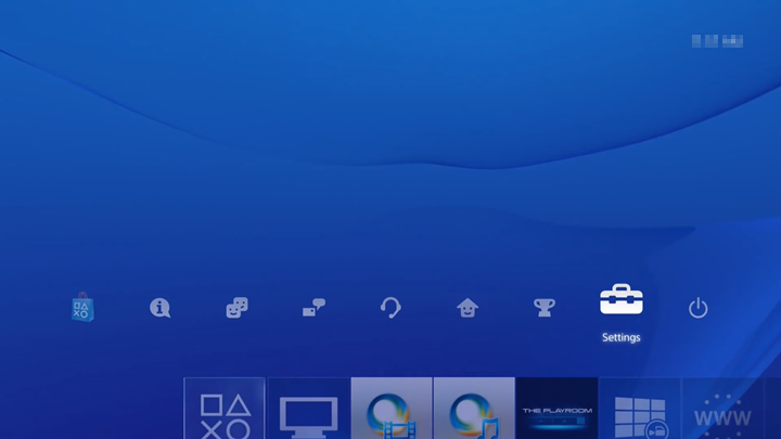 PS4 main screen with Settings icon selected. Screenshot.