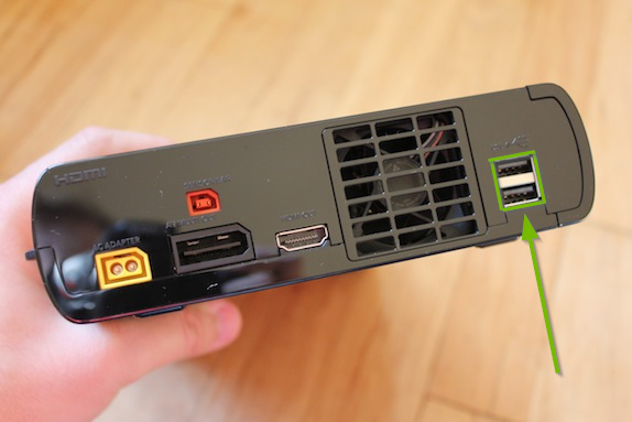 Rear of Wii U console with USB slots highlighted.