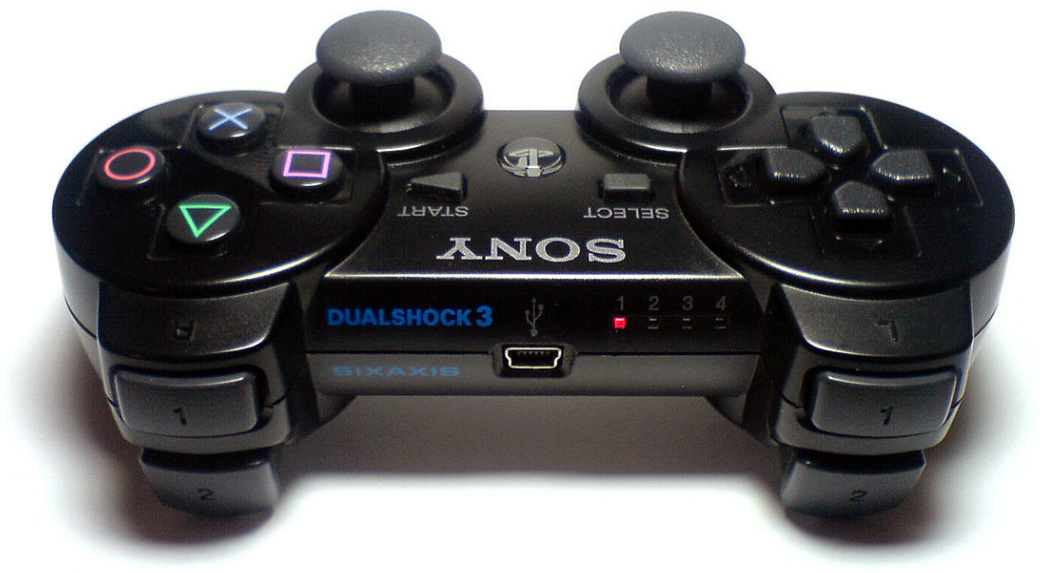 A ps3 controller with the lights on
