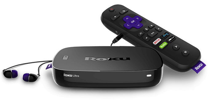 Roku Ultra with remote control and earbuds.