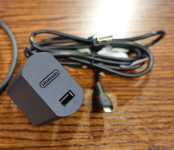Photo of the SNES Classic Edition's supplied USB cable and USB wall charger.