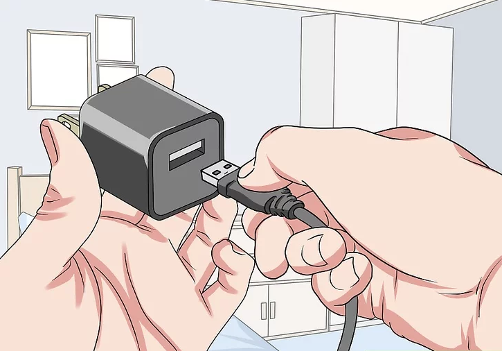 Image of a USB Type A cable being inserted into a USB wall charger