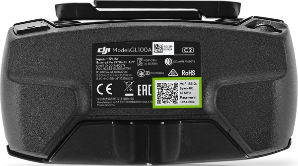 Wi-Fi credentials highlighted on back of the remote control.