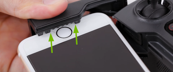 Clamp teeth pointed out, to properly position mobile device.