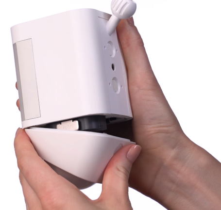 Battery compartment door being closed.