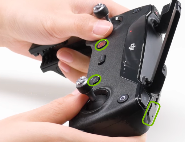 Linking buttons highlighted on remote control.