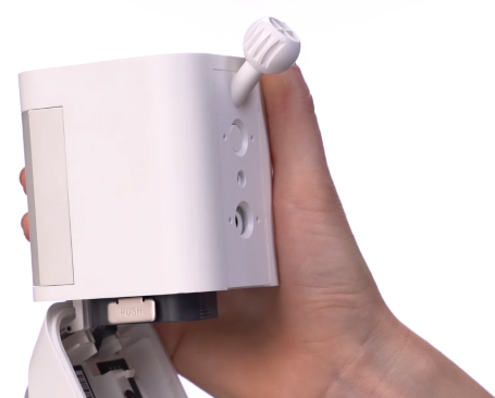 Mounting ball socket installed pointing upward on rear of Ring camera.