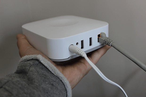 Back of a smartthings hub showing the connections and cables