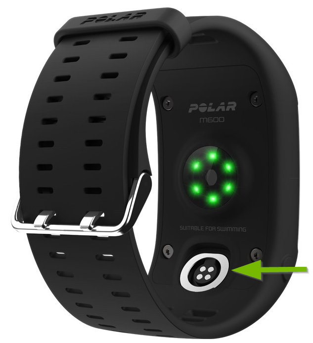 arrow pointing to the charger port on underside of the watch