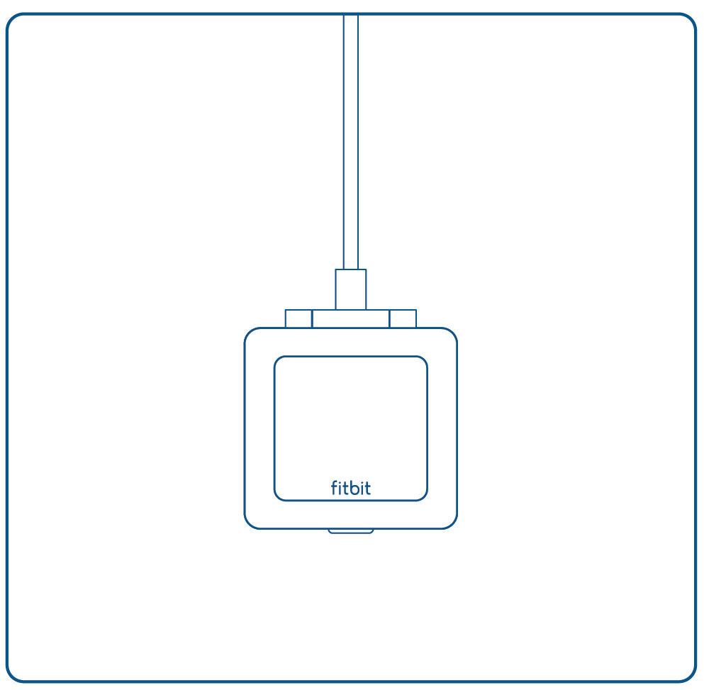 Fitbit tracker inside the charger cradle