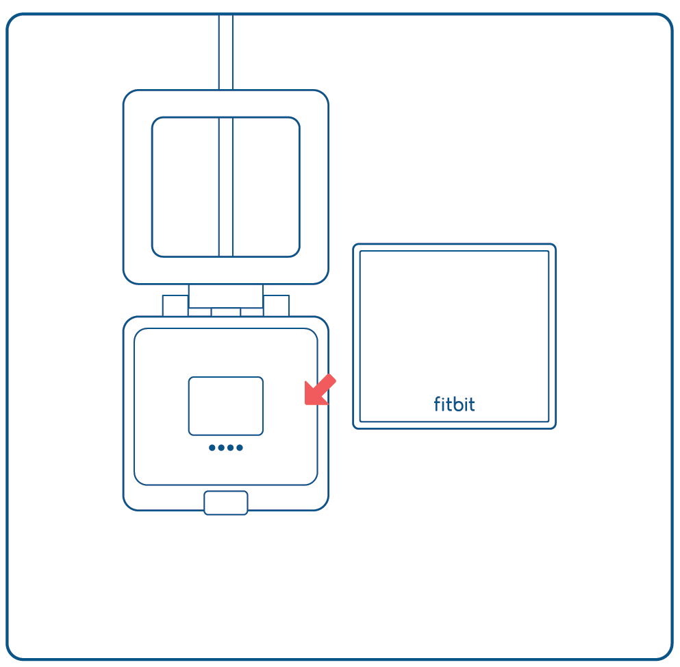 Fitbit tracker with arrow showing it to be moved over charger cradle