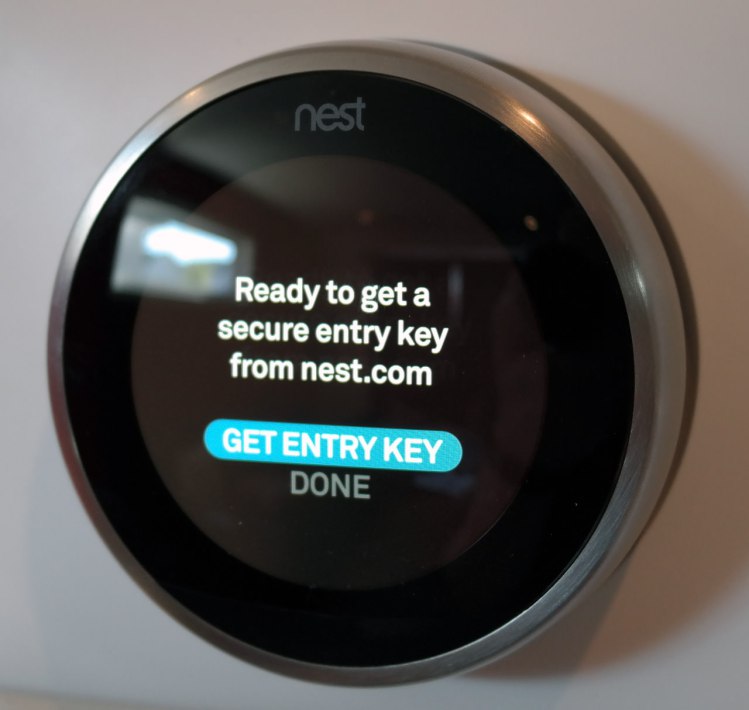 Nest thermostat highlighting the get entry key option.