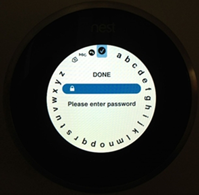 Nest thermostat prompting the user to enter the Wi-Fi network password.
