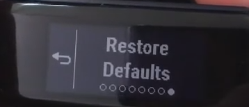 Garmin Vivosmart displaying the restore defaults option.