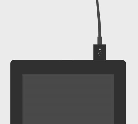 USB cable connected to tablet