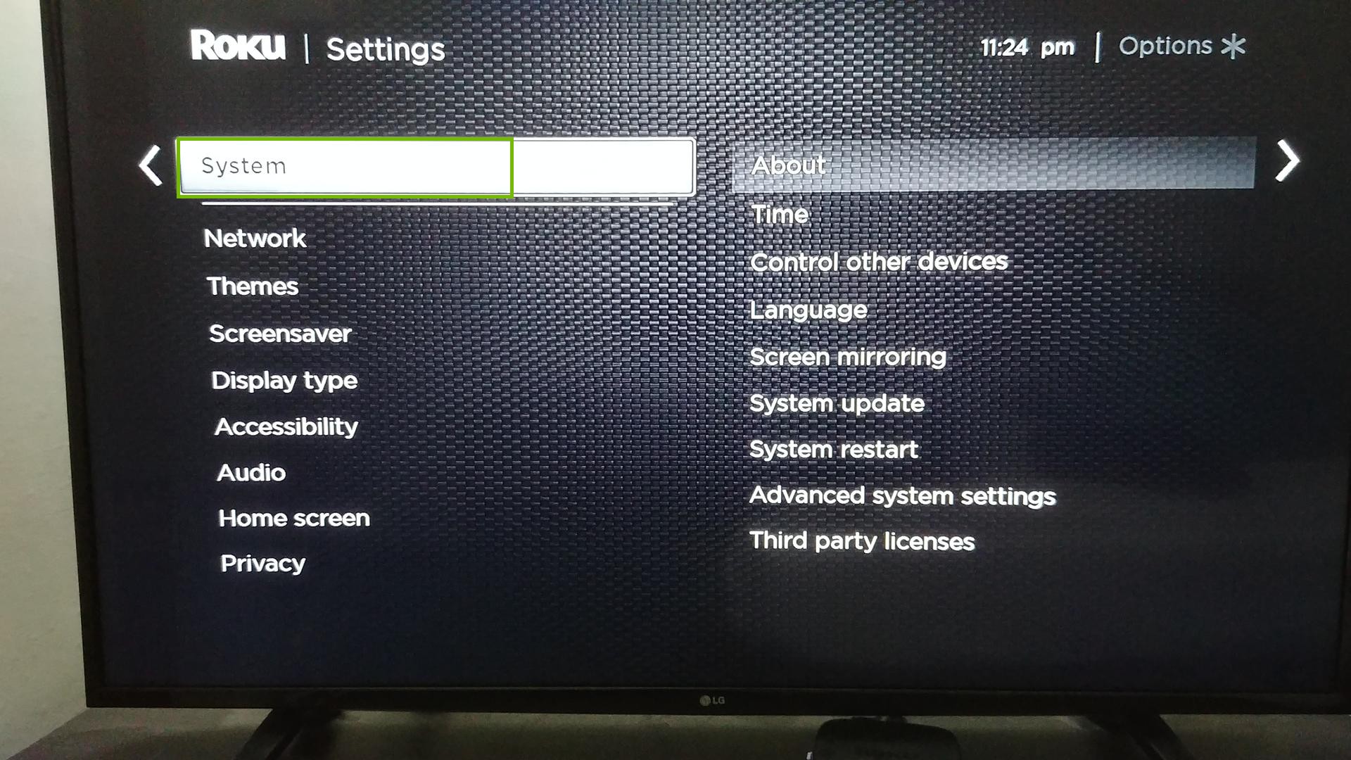 Roku TV Settings menu, highlighting the System option.
