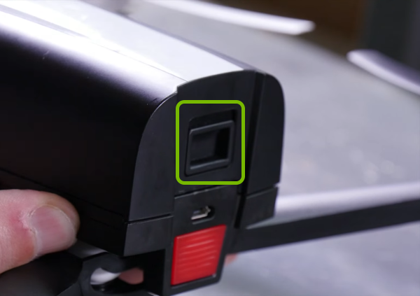 Latch on drone battery highlighted.