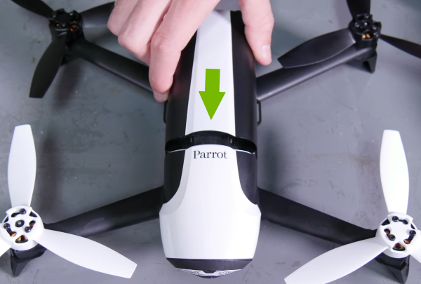 Battery being attached to drone.