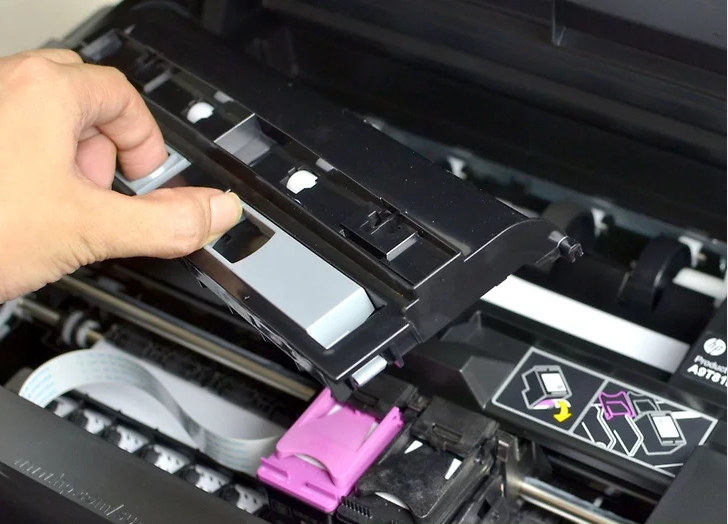 Photo of a printer's removable rear access door.