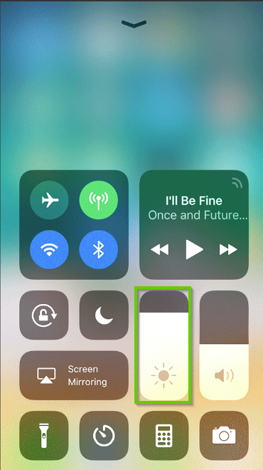 iPhone control menu with the brightness icon highlighted