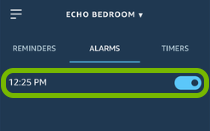 Alarm entry and toggle switch highlighted in Alexa app.