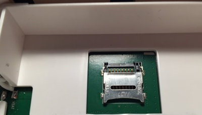 SD card slot inside battery compartment