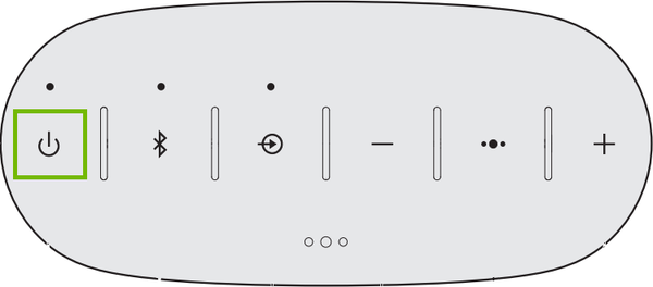 Diagram of speaker with power button highlighted.