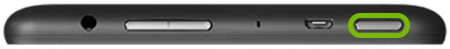 Power button highlighted on edge of Amazon Fire tablet.