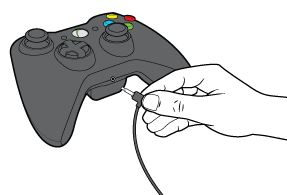 Xbox controller with headset connected.