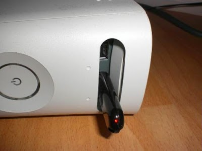 Xbox 360 showing a usb drive plugged in