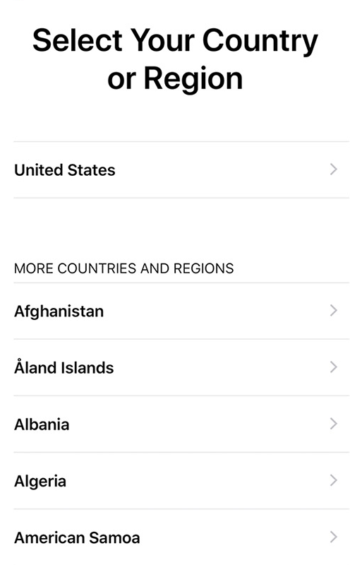 Country/region selection screen of iOS device setup.