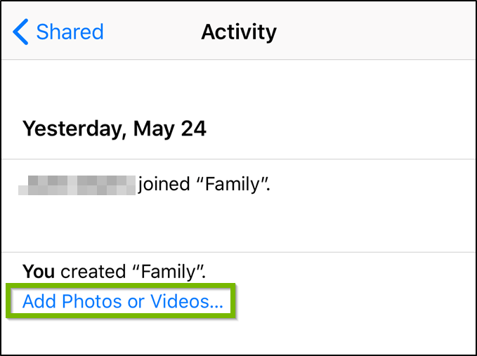 Photos app highlighting the add photos or videos option.