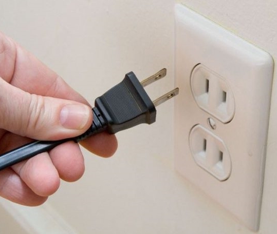 Power cable unplugged from power outlet.