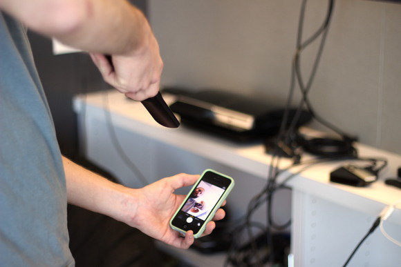 Remote pointed at smartphone camera.