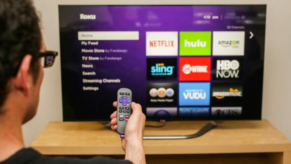 Roku remote pointed at TV.