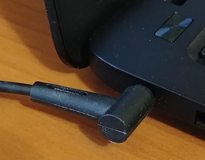Picture of a chromebook power adapter plugged in