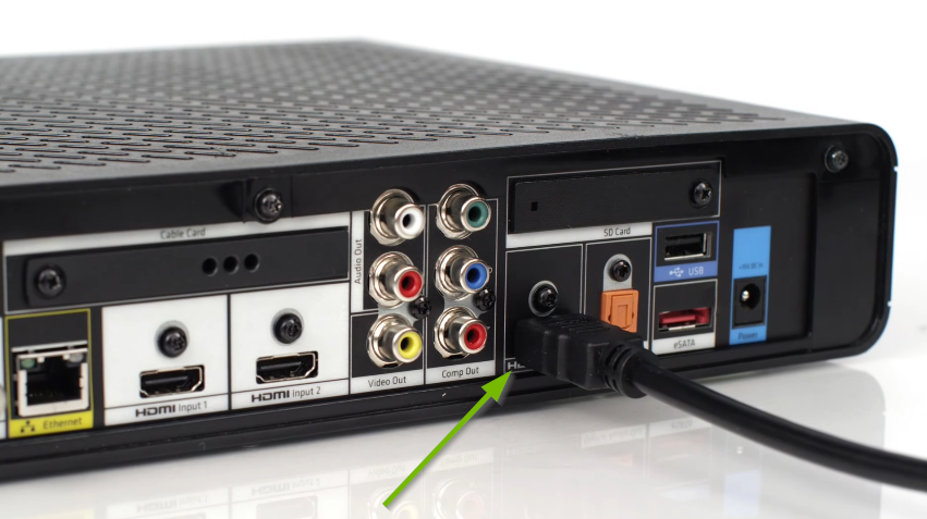 Connecting an HDMI cable to the rear of a video component.