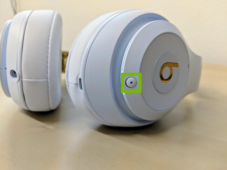 picture of headset with power button highlighted