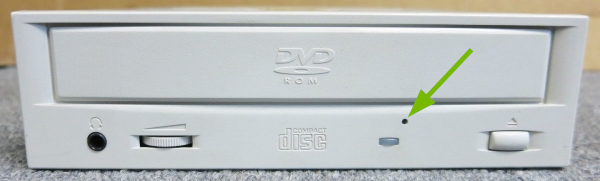 Pinhole pointed out on disc drive.