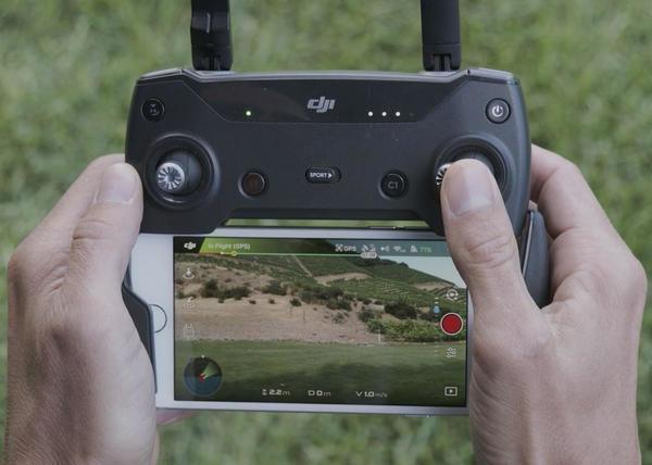 Remote Controller with Phone in use.