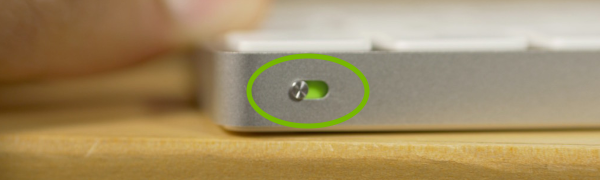 Power switch highlighted on Magic Keyboard.
