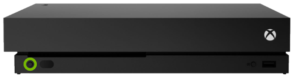 Eject button highlighted on front panel of Xbox One X.