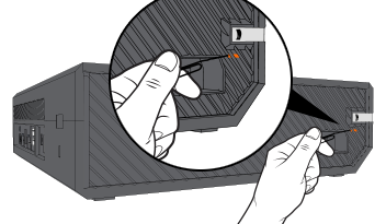 Pinhole location pointed out on left wall of Xbox One console.