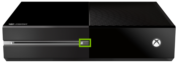 Eject button highlighted on front panel of Xbox One original.