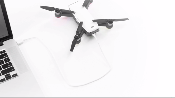 DJI Spark plugged into a laptop