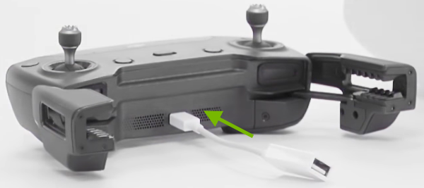 USB-OTG adapter being plugged into Spark remote control.