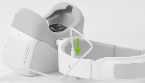 Micro USB cable plugged into goggles.